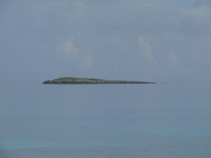 the water is calm this morning around the small cay